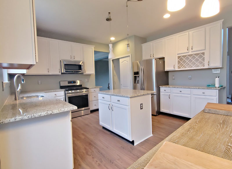 Kitchen after a remodel by A Woman's Brush